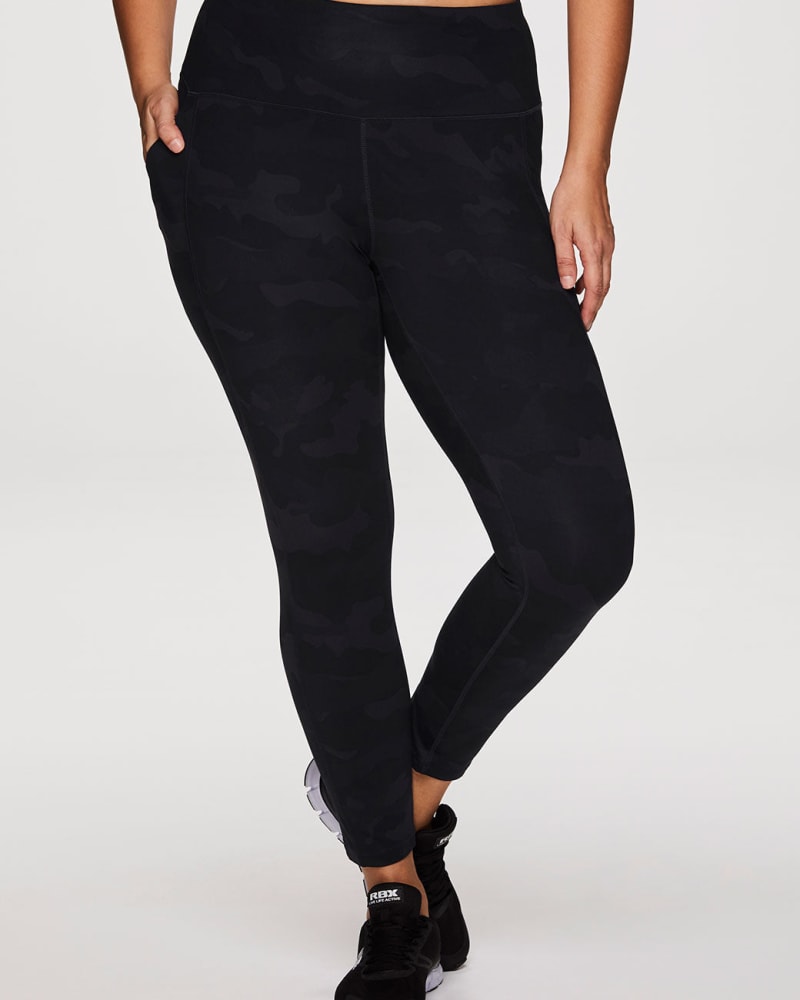 Front of a model wearing a size 1X Ultimate Camo Super Soft Legging in Black by RBX Active. | dia_product_style_image_id:244757